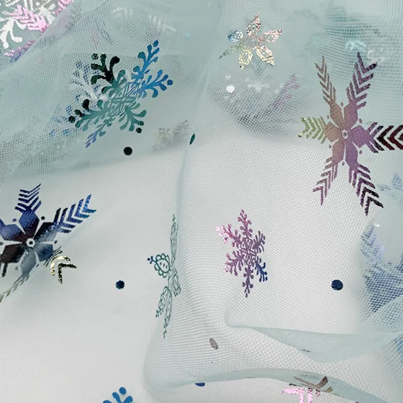100% Polyester Swissnet Iridescent Foil Snowflake Tulle Fabric