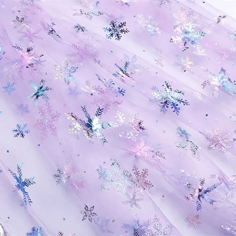 100% Polyester Swissnet Iridescent Foil Snowflake Tulle Fabric