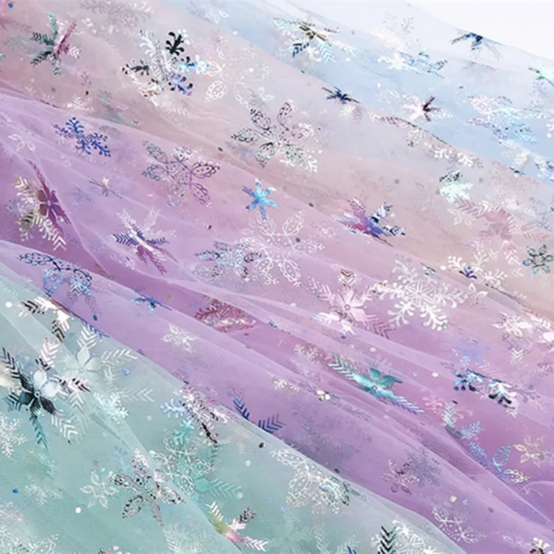 100% Polyester Swissnet Iridescent Foil Snowflake Tulle Fabric