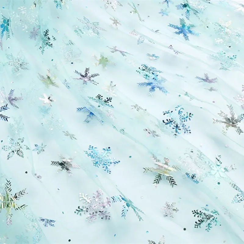 100% Polyester Swissnet Iridescent Foil Snowflake Tulle Fabric