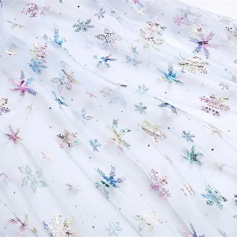 100% Polyester Swissnet Iridescent Foil Snowflake Tulle Fabric