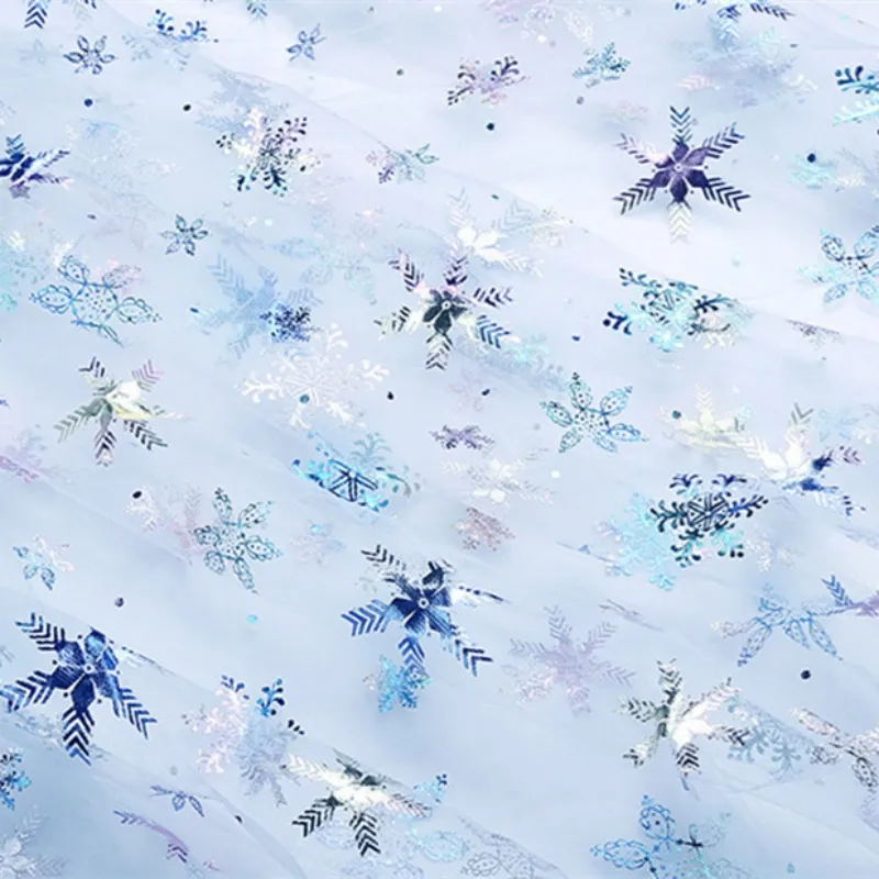 100% Polyester Swissnet Iridescent Foil Snowflake Tulle Fabric